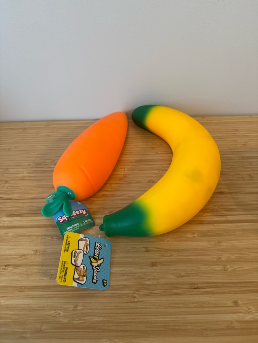 Viral Squ-eezy Banana & Carrot Trending Squishy Toy Duo - Yellow, Orange